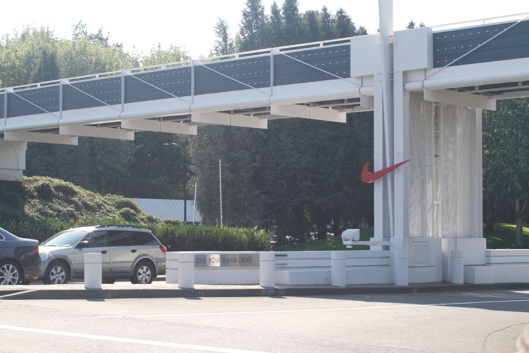 Nike World Headquarters campus entrance with large swoosh logo, Beaverton, Oregon